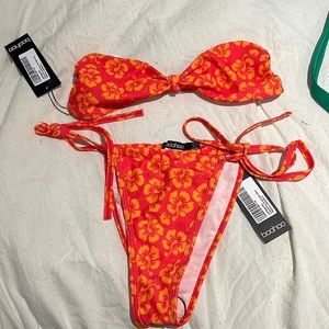 Brand new orange and red bikini. Top was too small super cute and comfortable.
